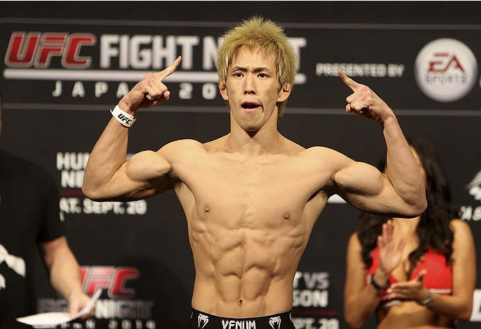 SAITAMA, JAPAN - SEPTEMBER 19: Michinori Tanaka steps on the scale during the UFC Fight Night weigh-in event on September 19, 2014 in Saitama, Japan. (Photo by Mitch Viquez/Zuffa LLC/Zuffa LLC via Getty Images)