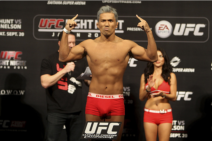 SAITAMA, JAPAN - SEPTEMBER 19: Takenori Sato steps on the scale during the UFC Fight Night weigh-in event on September 19, 2014 in Saitama, Japan. (Photo by Mitch Viquez/Zuffa LLC/Zuffa LLC via Getty Images)