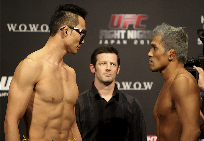 SAITAMA, JAPAN - SEPTEMBER 19: (L and R) Hyun Gyu Lim and Takenori Sato during the UFC Fight Night weigh-in event on September 19, 2014 in Saitama, Japan. (Photo by Mitch Viquez/Zuffa LLC/Zuffa LLC via Getty Images)