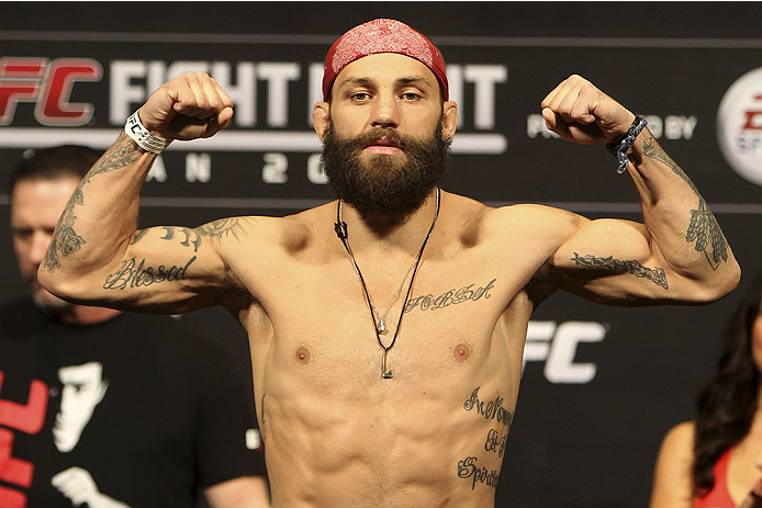 SAITAMA, JAPAN - SEPTEMBER 19: Sam Sicilia steps on the scale during the UFC Fight Night weigh-in event on September 19, 2014 in Saitama, Japan. (Photo by Mitch Viquez/Zuffa LLC/Zuffa LLC via Getty Images)