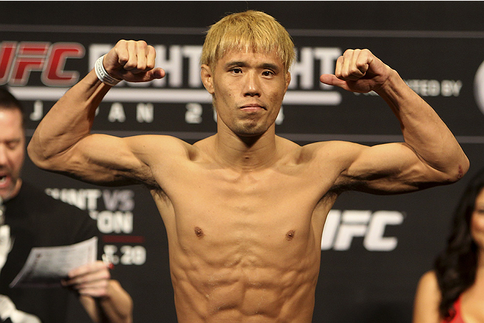 SAITAMA, JAPAN - SEPTEMBER 19: Masanori Kanehara steps on the scale during the UFC Fight Night weigh-in event on September 19, 2014 in Saitama, Japan. (Photo by Mitch Viquez/Zuffa LLC/Zuffa LLC via Getty Images)