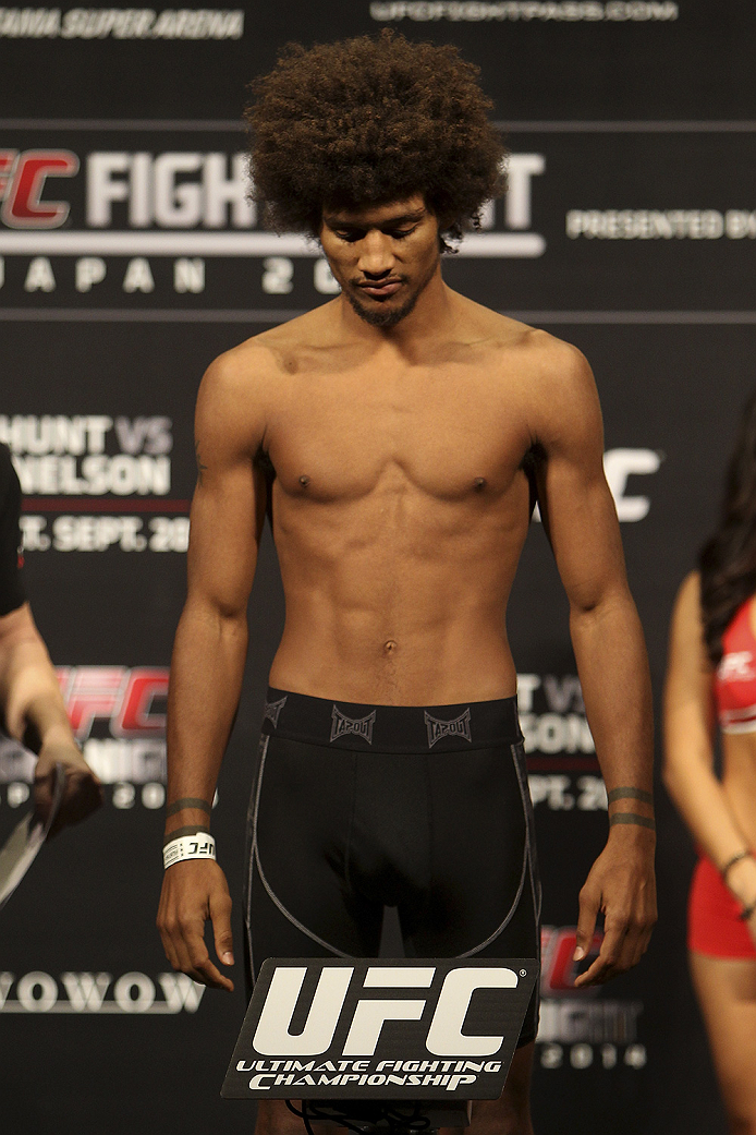SAITAMA, JAPAN - SEPTEMBER 19: Alex Caceres steps on the scale during the UFC Fight Night weigh-in event on September 19, 2014 in Saitama, Japan. (Photo by Mitch Viquez/Zuffa LLC/Zuffa LLC via Getty Images)