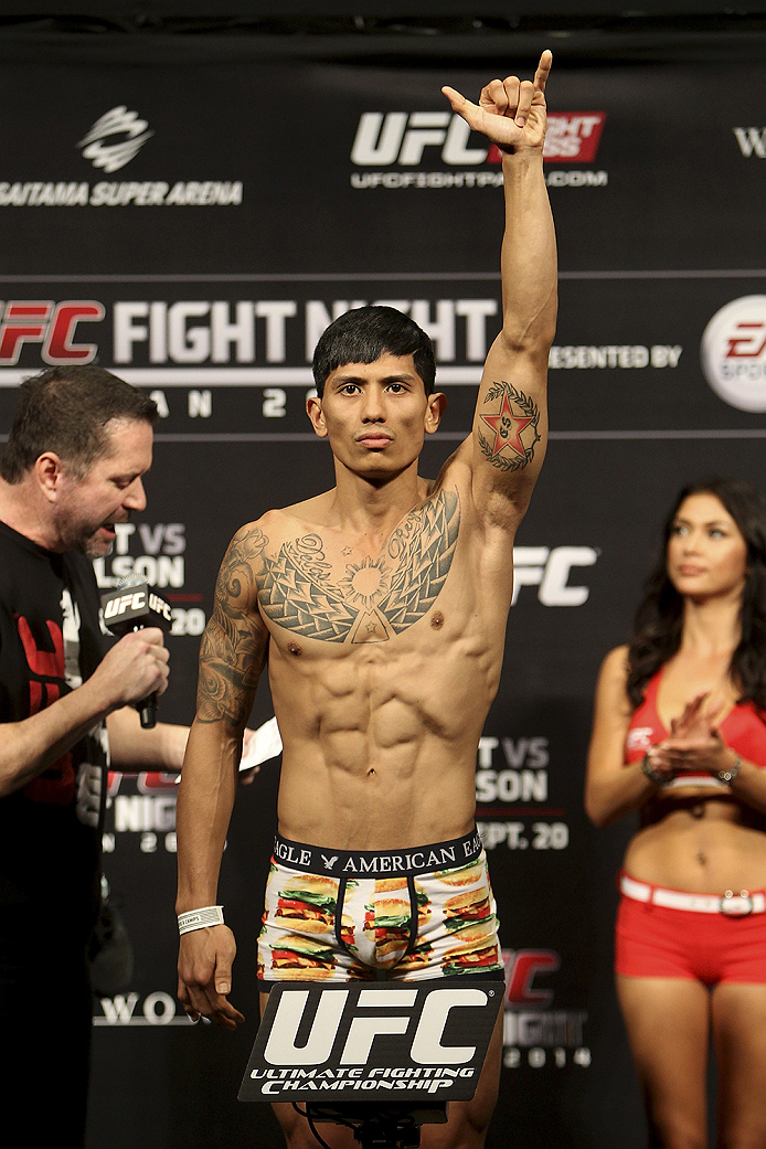SAITAMA, JAPAN - SEPTEMBER 19: Jon Delos Reyes steps on the scale during the UFC Fight Night weigh-in event on September 19, 2014 in Saitama, Japan. (Photo by Mitch Viquez/Zuffa LLC/Zuffa LLC via Getty Images)