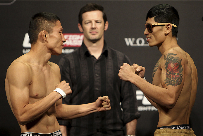 SAITAMA, JAPAN - SEPTEMBER 19: (L and R) Kyoji Horiguchi and Jon Delos Reyes during the UFC Fight Night weigh-in event on September 19, 2014 in Saitama, Japan. (Photo by Mitch Viquez/Zuffa LLC/Zuffa LLC via Getty Images)