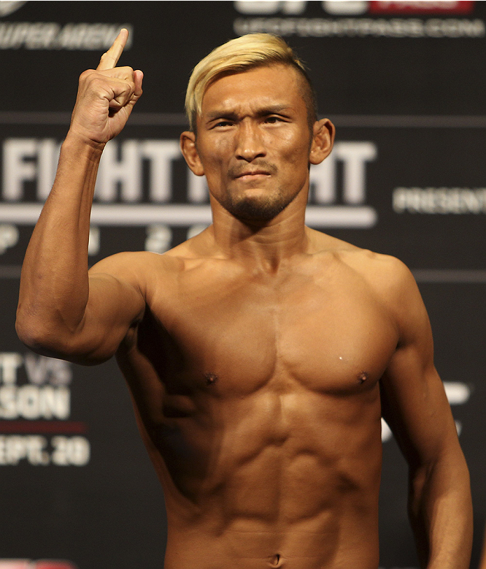 SAITAMA, JAPAN - SEPTEMBER 19: Kiichi Kunimoto steps on the scale during the UFC Fight Night weigh-in event on September 19, 2014 in Saitama, Japan. (Photo by Mitch Viquez/Zuffa LLC/Zuffa LLC via Getty Images)