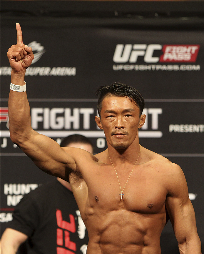 SAITAMA, JAPAN - SEPTEMBER 19: Yoshihiro Akiyama steps on the scale during the UFC Fight Night weigh-in event on September 19, 2014 in Saitama, Japan. (Photo by Mitch Viquez/Zuffa LLC/Zuffa LLC via Getty Images)