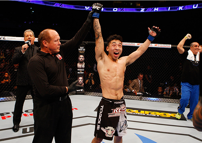 MANILA, PHILIPPINES - MAY 16: Yao Zhikui of China reacts after his win over Nolan Ticman of the United States in their flyweight fight during the UFC Fight Night event at the Mall of Asia Arena on May 16, 2015 in Manila, Philippines. (Photo by Mitch Viqu