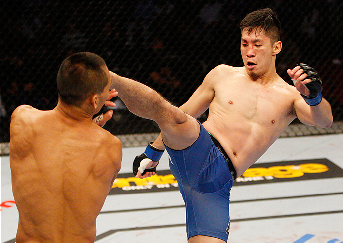 MANILA, PHILIPPINES - MAY 16: Royston Wee of Singapore throws a kick at Ning Guangyou of China in their bantamweight fight during the UFC Fight Night event at the Mall of Asia Arena on May 16, 2015 in Manila, Philippines. (Photo by Mitch Viquez/Zuffa LLC