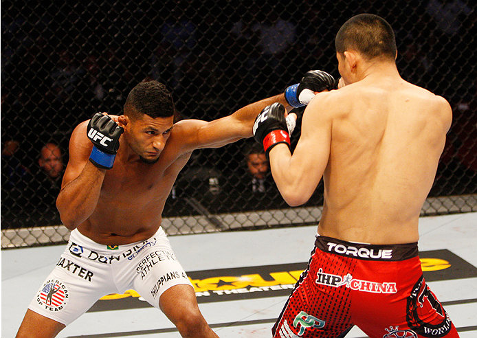 MANILA, PHILIPPINES - MAY 16: Dhiego Lima of Brazil throws a punch at Li Jingling of China in their welterweight fight during the UFC Fight Night event at the Mall of Asia Arena on May 16, 2015 in Manila, Philippines. (Photo by Mitch Viquez/Zuffa LLC/Zuf