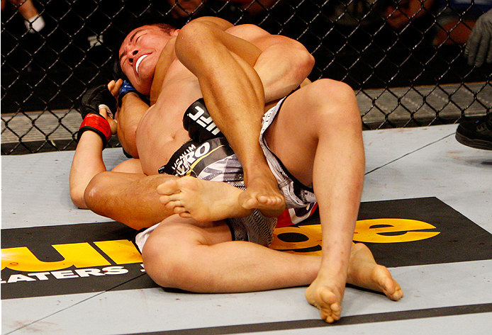 MANILA, PHILIPPINES - MAY 16: Jon Tuck of Guam goes for a submission on Tae Hyun Bang of South Korea in their lightweight fight during the UFC Fight Night event at the Mall of Asia Arena on May 16, 2015 in Manila, Philippines. (Photo by Mitch Viquez/Zuffa