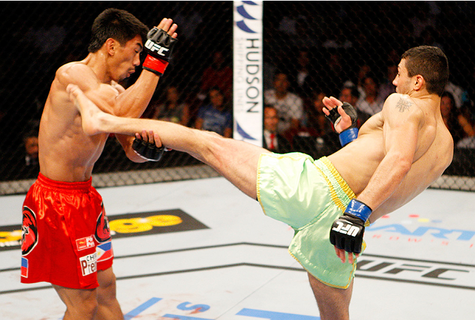 MANILA, PHILIPPINES - MAY 16: Levan Makashvili of the United States goes for a kick on Mark Eddiva of the Philippines in their featherweight fight during the UFC Fight Night event at the Mall of Asia Arena on May 16, 2015 in Manila, Philippines. (Photo b