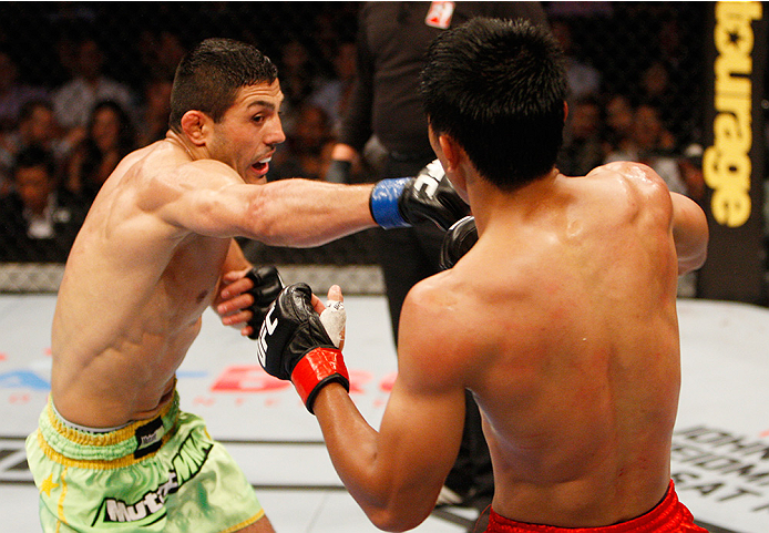 MANILA, PHILIPPINES - MAY 16: Levan Makashvili of the United States throws a punch at Mark Eddiva of the Philippines in their featherweight fight during the UFC Fight Night event at the Mall of Asia Arena on May 16, 2015 in Manila, Philippines. (Photo by