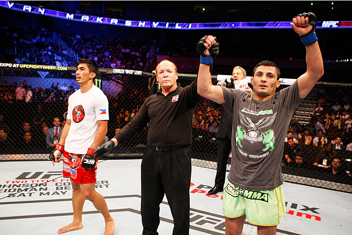 MANILA, PHILIPPINES - MAY 16: Levan Makashvili of the United States celebrates after his win over Mark Eddiva of the Philippines in their featherweight fight during the UFC Fight Night event at the Mall of Asia Arena on May 16, 2015 in Manila, Philippine
