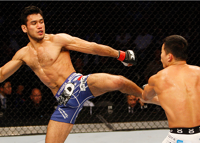 MANILA, PHILIPPINES - MAY 16: Phillipe Nover of the United States kicks Yui Chul Nam of South Korea in their featherweight fight during the UFC Fight Night event at the Mall of Asia Arena on May 16, 2015 in Manila, Philippines. (Photo by Mitch Viquez/Zuff