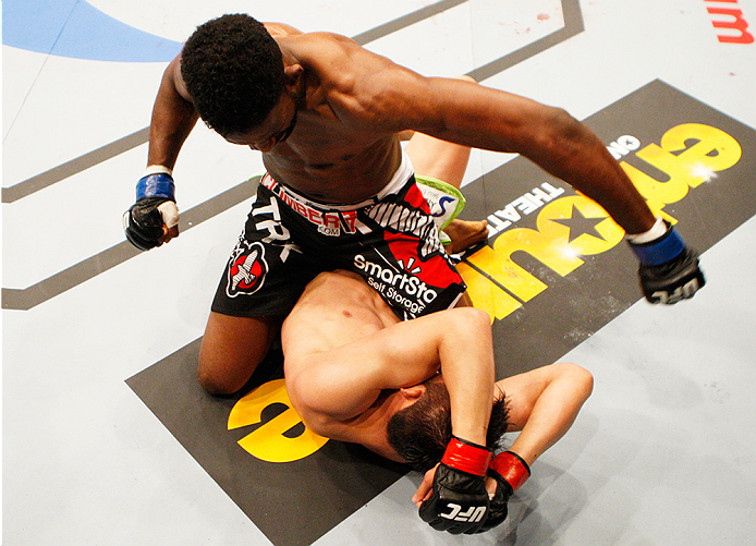 MANILA, PHILIPPINES - MAY 16: Neil Magny of the United States punches Hyun Gyu Lim of South Korea in their welterweight fight during the UFC Fight Night event at the Mall of Asia Arena on May 16, 2015 in Manila, Philippines. (Photo by Mitch Viquez/Zuffa