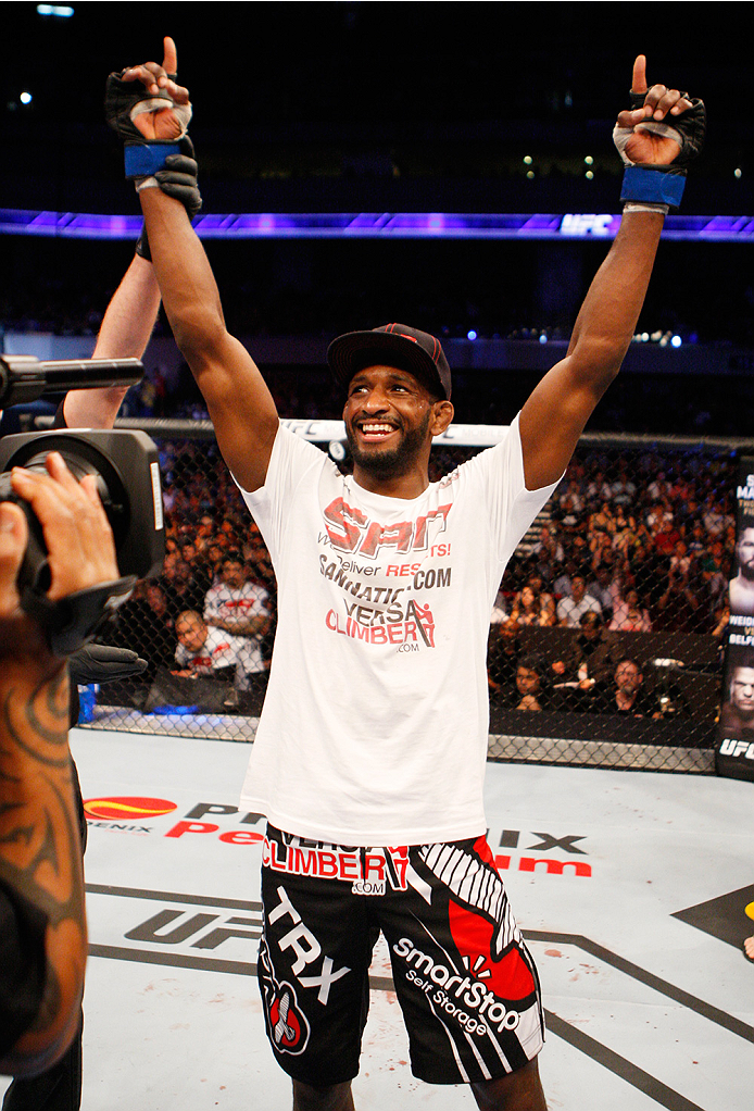 MANILA, PHILIPPINES - MAY 16: Neil Magny of the United States celebrates his win over Hyun Gyu Lim of South Korea in their welterweight fight during the UFC Fight Night event at the Mall of Asia Arena on May 16, 2015 in Manila, Philippines. (Photo by Mitc