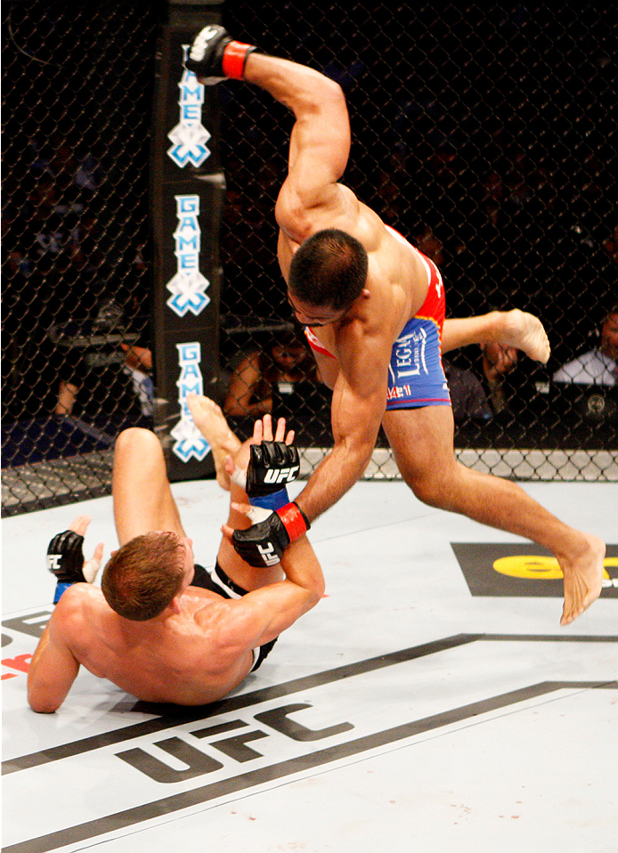 MANILA, PHILIPPINES - MAY 16: Mark Munoz of the United States goes for a punch on Luke Barnatt of England in their middleweight fight during the UFC Fight Night event at the Mall of Asia Arena on May 16, 2015 in Manila, Philippines. (Photo by Mitch Viquez