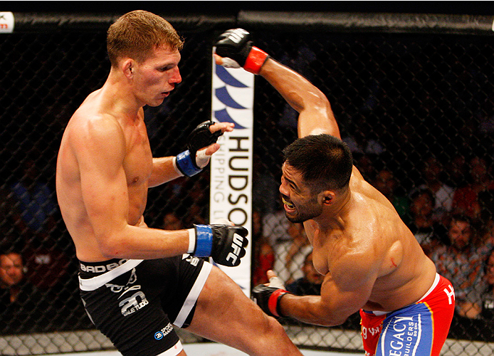 MANILA, PHILIPPINES - MAY 16: Mark Munoz of the United States throws a punch at Luke Barnatt of England in their middleweight fight during the UFC Fight Night event at the Mall of Asia Arena on May 16, 2015 in Manila, Philippines. (Photo by Mitch Viquez/