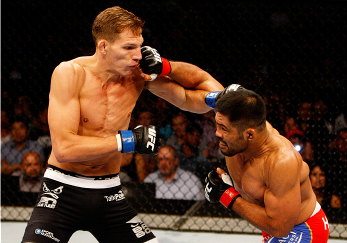 MANILA, PHILIPPINES - MAY 16: Mark Munoz of the United States throws a punch at Luke Barnatt of England in their middleweight fight during the UFC Fight Night event at the Mall of Asia Arena on May 16, 2015 in Manila, Philippines. (Photo by Mitch Viquez/