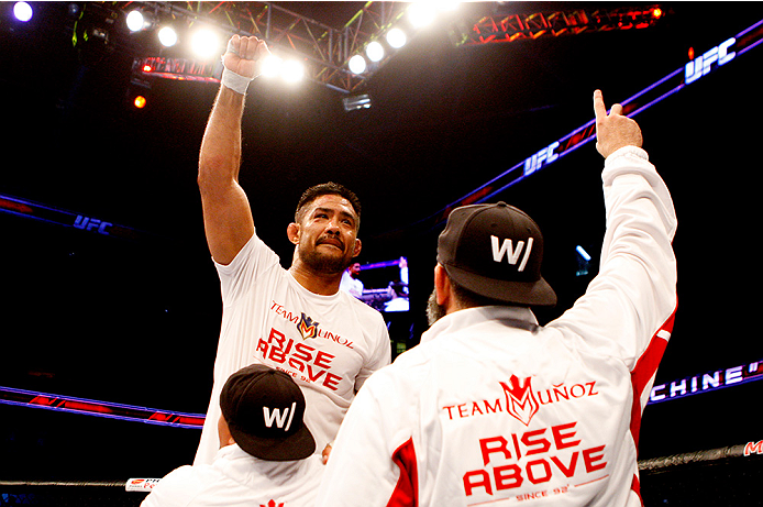 MANILA, PHILIPPINES - MAY 16: Mark Munoz of the United States celebrates his win over Luke Barnatt of England in their middleweight fight during the UFC Fight Night event at the Mall of Asia Arena on May 16, 2015 in Manila, Philippines. (Photo by Mitch V
