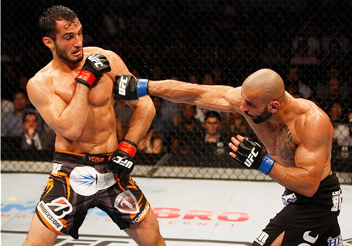 MANILA, PHILIPPINES - MAY 16: Costas Philippou of the United States throws a punch at Gegard Mousasi of the Netherlands in their middleweight fight during the UFC Fight Night event at the Mall of Asia Arena on May 16, 2015 in Manila, Philippines. (Photo