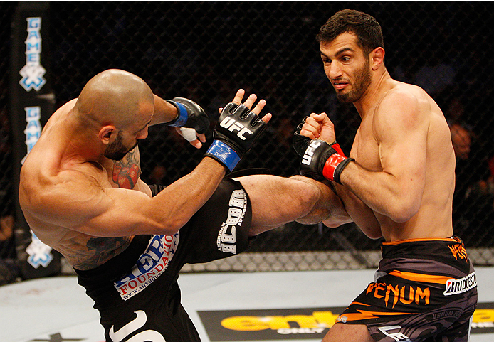 MANILA, PHILIPPINES - MAY 16: Costas Philippou of the United States kicks Gegard Mousasi of the Netherlands in their middleweight fight during the UFC Fight Night event at the Mall of Asia Arena on May 16, 2015 in Manila, Philippines. (Photo by Mitch Viq