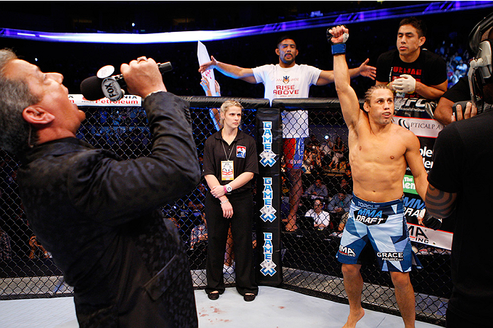 MANILA, PHILIPPINES - MAY 16: UFC announcer, Bruce Buffer introduces Uriah Faber of the United States before his featherweight fight during the UFC Fight Night event at the Mall of Asia Arena on May 16, 2015 in Manila, Philippines. (Photo by Mitch Viquez/