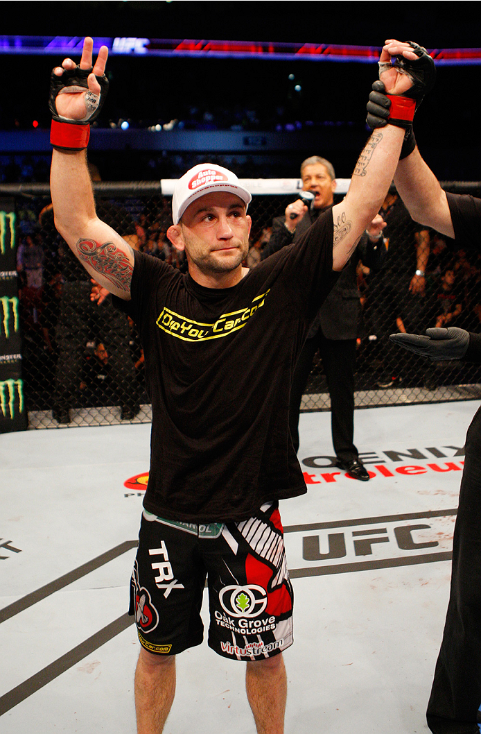 MANILA, PHILIPPINES - MAY 16: Frankie Edgar of the United States celebrates his win over Uriah Faber of the United States in their featherweight fight during the UFC Fight Night event at the Mall of Asia Arena on May 16, 2015 in Manila, Philippines. (Pho