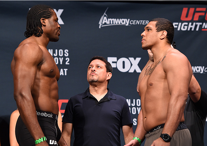 ORLANDO, FL - DECEMBER 18: (L-R) Opponents Francis Ngannou of France and Luis Henrique of Brazil face off during the UFC weigh-in at the Orange County Convention Center on December 18, 2015 in Orlando, Florida. (Photo by Josh Hedges/Zuffa LLC/Zuffa LLC