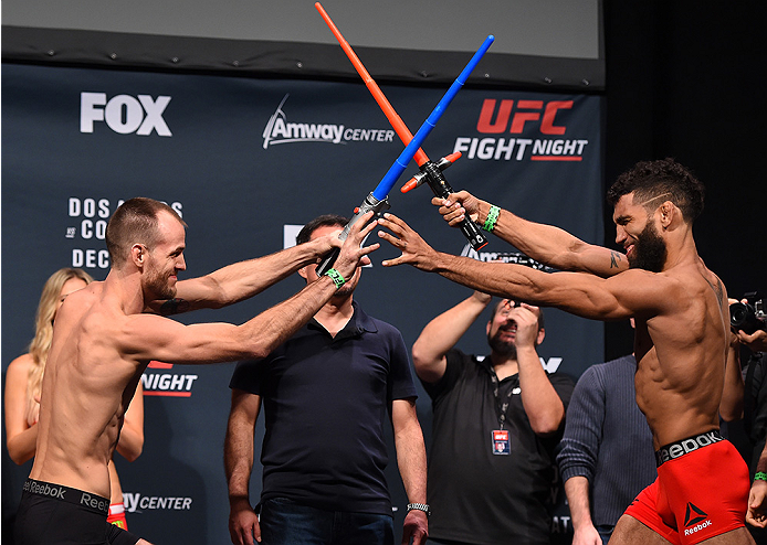 ORLANDO, FL - DECEMBER 18: (L-R) Opponents Cole Miller and Jim Alers face off during the UFC weigh-in at the Orange County Convention Center on December 18, 2015 in Orlando, Florida. (Photo by Josh Hedges/Zuffa LLC/Zuffa LLC via Getty Images)