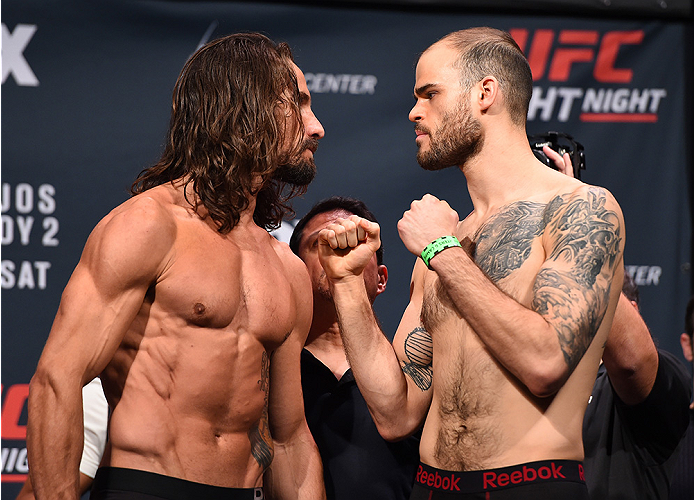 ORLANDO, FL - DECEMBER 18: (L-R) Opponents Josh Samman and Tamdan McCrory face off during the UFC weigh-in at the Orange County Convention Center on December 18, 2015 in Orlando, Florida. (Photo by Josh Hedges/Zuffa LLC/Zuffa LLC via Getty Images)