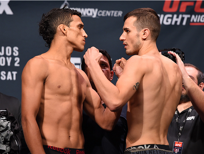 ORLANDO, FL - DECEMBER 18: (L-R) Opponents Charles Oliveira of Brazil and Myles Jury face off during the UFC weigh-in at the Orange County Convention Center on December 18, 2015 in Orlando, Florida. (Photo by Josh Hedges/Zuffa LLC/Zuffa LLC via Getty Im