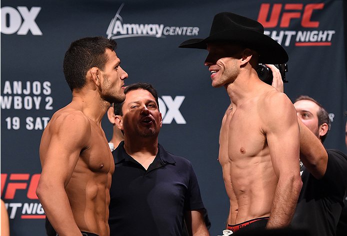 ORLANDO, FL - DECEMBER 18: (L-R) Opponents Rafael dos Anjos of Brazil and Donald 'Cowboy' Cerrone face off during the UFC weigh-in at the Orange County Convention Center on December 18, 2015 in Orlando, Florida. (Photo by Josh Hedges/Zuffa LLC/Zuffa LLC