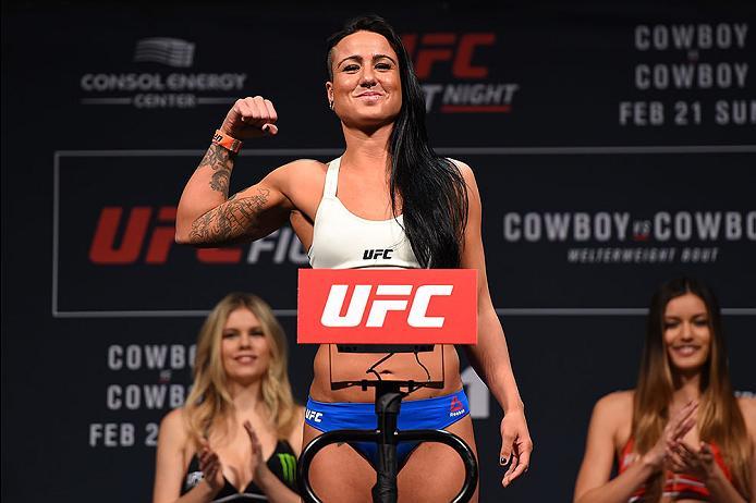 PITTSBURGH, PA - FEBRUARY 20: Ashlee Evans-Smith steps on the scale during the UFC Fight Night weigh-in at Stage AE on February 20, 2016 in Pittsburgh, Pennsylvania. (Photo by Jeff Bottari/Zuffa LLC/Zuffa LLC via Getty Images)