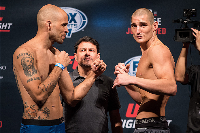 SAN DIEGO, CA - JULY 14: (L-R) Igor Araujo of Brazil and Sean Strickland face-off during the UFC weigh-in at the Valley View Casino Center on July 14, 2015 in San Diego, California. (Photo by Jeff Bottari/Zuffa LLC/Zuffa LLC via Getty Images)