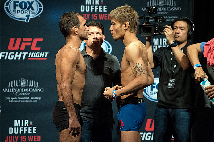 SAN DIEGO, CA - JULY 14: (L-R) Rani Yahya of Brazil and Masanori Kanehara of Japan face-off during the UFC weigh-in at the Valley View Casino Center on July 14, 2015 in San Diego, California. (Photo by Jeff Bottari/Zuffa LLC/Zuffa LLC via Getty Images)