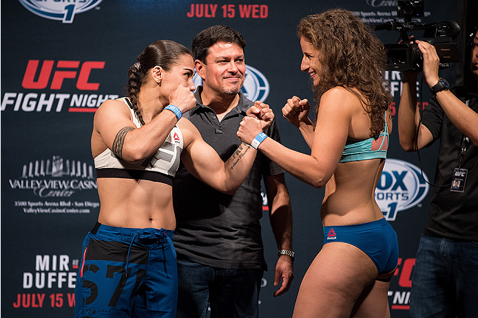 SAN DIEGO, CA - JULY 14: (L-R) Jessica Andrade of Brazil and Sarah Moras face-off during the UFC weigh-in at the Valley View Casino Center on July 14, 2015 in San Diego, California. (Photo by Jeff Bottari/Zuffa LLC/Zuffa LLC via Getty Images)