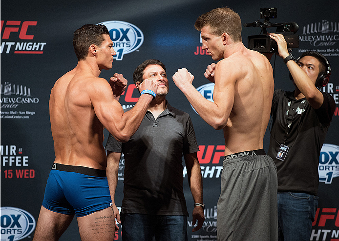 SAN DIEGO, CA - JULY 14: (L-R) Alan Jouban and Matt Dwyer of Canada face-off during the UFC weigh-in at the Valley View Casino Center on July 14, 2015 in San Diego, California. (Photo by Jeff Bottari/Zuffa LLC/Zuffa LLC via Getty Images)