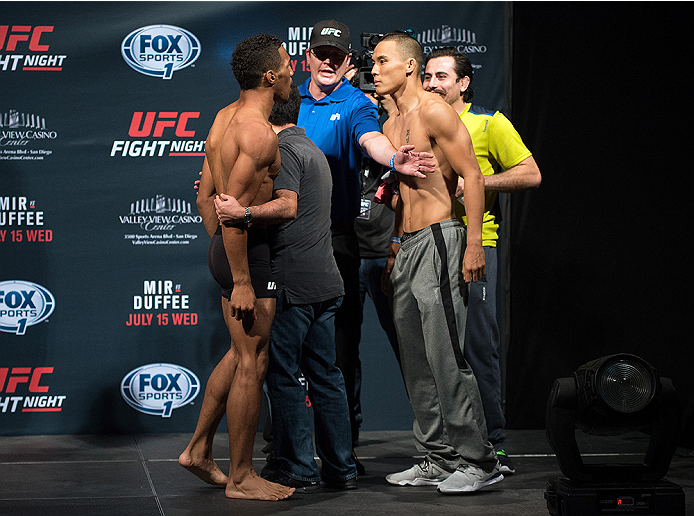 SAN DIEGO, CA - JULY 14: (L-R) Kevin Lee and James Moontasri face-off during the UFC weigh-in at the Valley View Casino Center on July 14, 2015 in San Diego, California. (Photo by Jeff Bottari/Zuffa LLC/Zuffa LLC via Getty Images)
