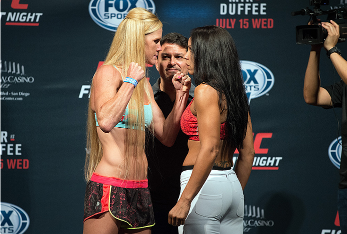 SAN DIEGO, CA - JULY 14: (L-R) Holly Holm and Marion Reneau face-off during the UFC weigh-in at the Valley View Casino Center on July 14, 2015 in San Diego, California. (Photo by Jeff Bottari/Zuffa LLC/Zuffa LLC via Getty Images)