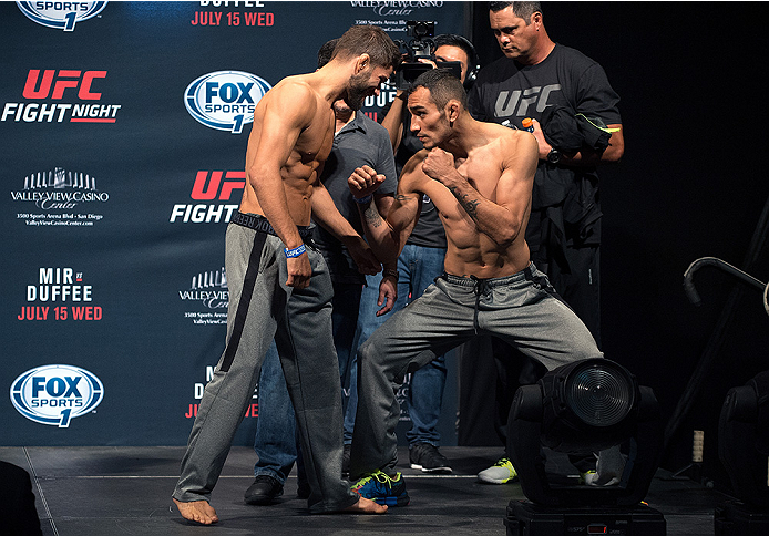 SAN DIEGO, CA - JULY 14: (L-R) Josh Thomson and Tony Ferguson face-off during the UFC weigh-in at the Valley View Casino Center on July 14, 2015 in San Diego, California. (Photo by Jeff Bottari/Zuffa LLC/Zuffa LLC via Getty Images)