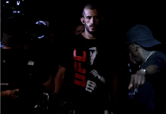 SINGAPORE - JANUARY 04: Quinn Mulhern walks up before his lightweight bout with Katsunori Kikuno during the UFC Fight Night event at the Marina Bay Sands Resort on January 4, 2014 in Singapore. (Photo by Mitch Viquez/Zuffa LLC/Zuffa LLC via Getty Images)
