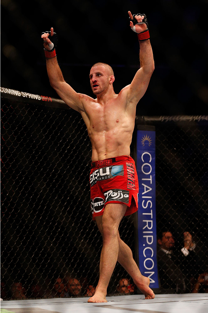 SINGAPORE - JANUARY 04: Tarec Saffiedine reacts after the conclusion of his welterweight bout against Lim Hyun Gyu during the UFC Fight Night event at the Marina Bay Sands Resort on January 4, 2014 in Singapore. (Photo by Josh Hedges/Zuffa LLC/Zuffa LLC