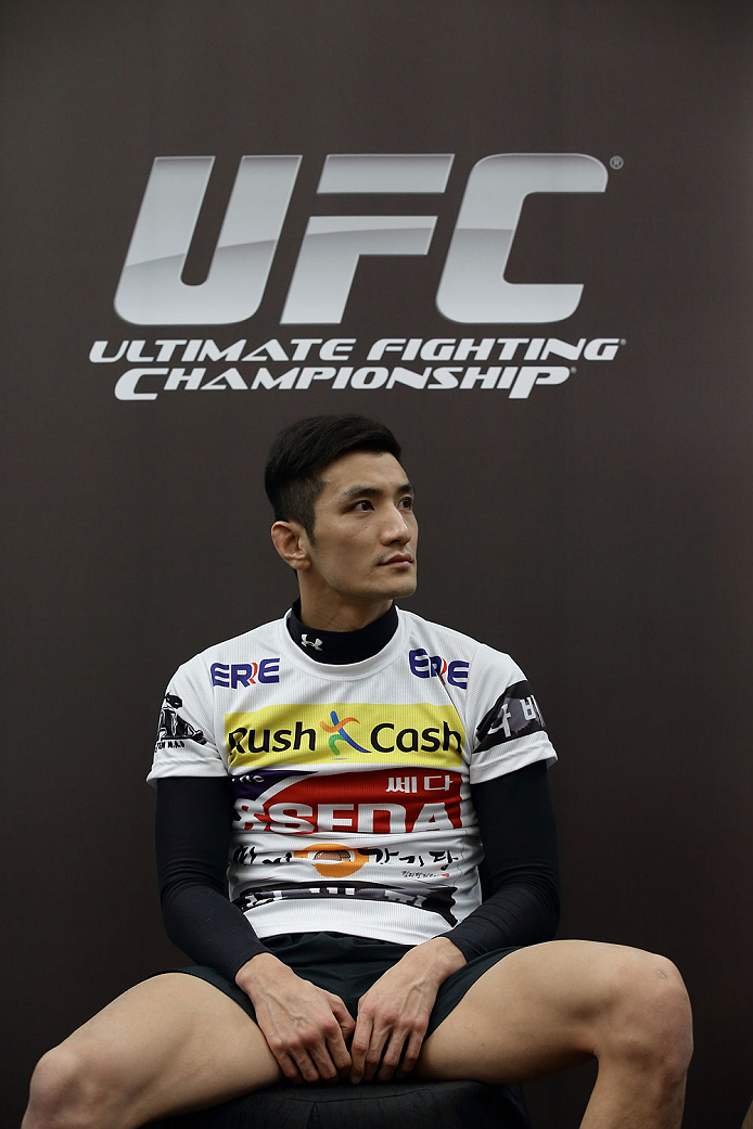 SINGAPORE - JANUARY 02: Kyung Ho Kang attends the UFC Fight Night Singapore Ultimate Media Day at the Skating Rink at The Shoppes at Marina Bay Sand on January 2, 2014 in Singapore. (Photo by Suhaimi Abdullah/Zuffa LLC)