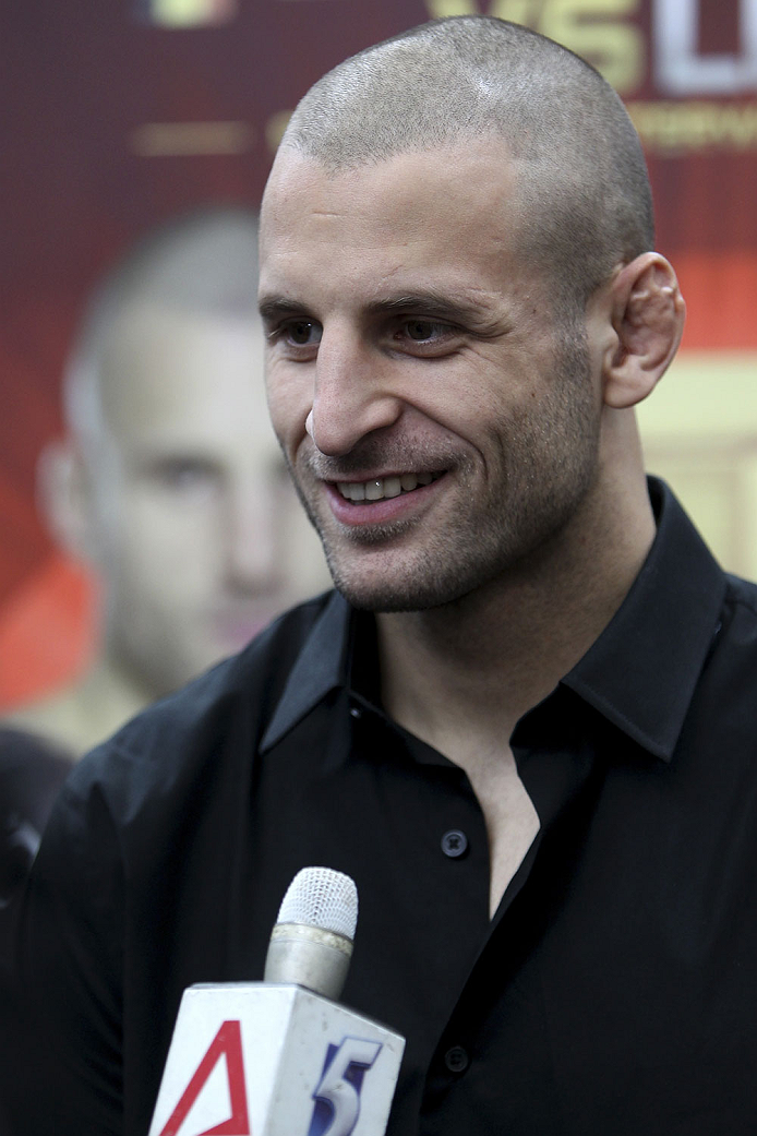 SINGAPORE - JANUARY 02: Tarec Saffiedine interacts with media during the UFC Fight Night Singapore Ultimate Media Day at the Shoppes at Marina Bay Sands on January 2, 2014 in Singapore. (Photo by Mitch Viquez/Zuffa LLC/Zuffa LLC via Getty Images)