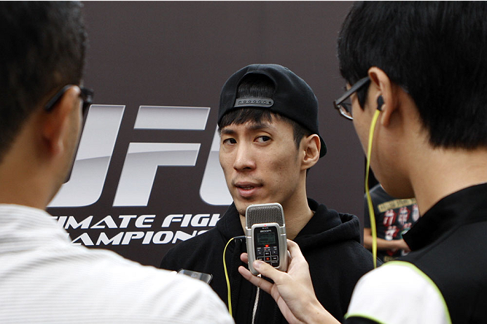 SINGAPORE - JANUARY 02: Royston Wee interacts with media during the UFC Fight Night Singapore Ultimate Media Day at the Shoppes at Marina Bay Sands on January 2, 2014 in Singapore. (Photo by Mitch Viquez/Zuffa LLC/Zuffa LLC via Getty Images)