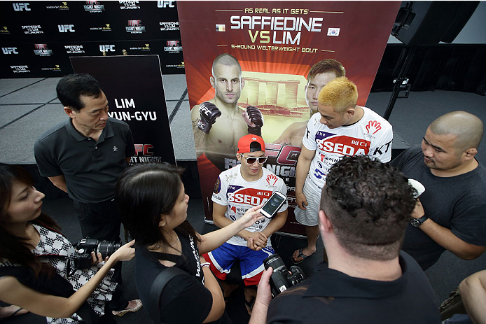 SINGAPORE - JANUARY 02: Lim Hyun Gyu speaks to the media during the UFC Fight Night Singapore Ultimate Media Day at the Skating Rink at The Shoppes at Marina Bay Sand on January 2, 2014 in Singapore. (Photo by Suhaimi Abdullah/Zuffa LLC)