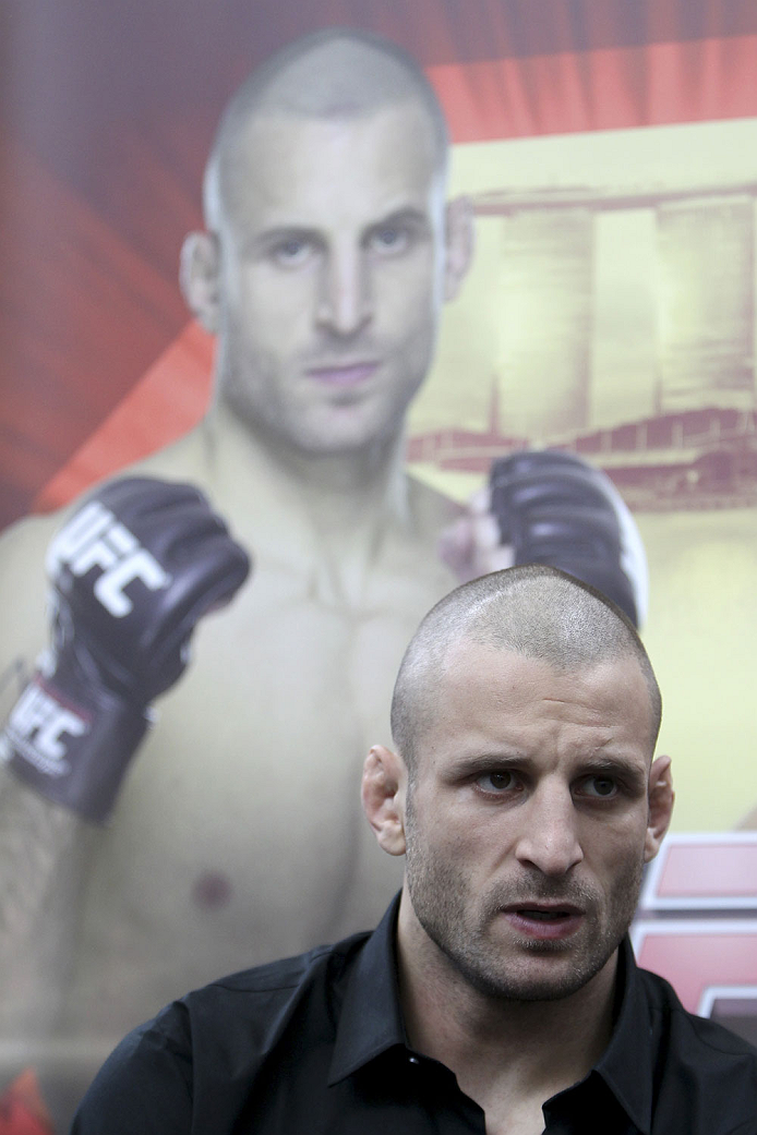 SINGAPORE - JANUARY 02: Tarec Saffiedine interacts with media during the UFC Fight Night Singapore Ultimate Media Day at the Shoppes at Marina Bay Sands on January 2, 2014 in Singapore. (Photo by Mitch Viquez/Zuffa LLC/Zuffa LLC via Getty Images)