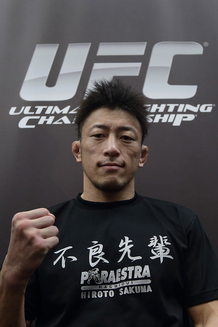SINGAPORE - JANUARY 02: Tatsuya Kawajiri poses for a photo during the UFC Fight Night Singapore Ultimate Media Day at the Skating Rink at The Shoppes at Marina Bay Sand on January 2, 2014 in Singapore. (Photo by Suhaimi Abdullah/Zuffa LLC)