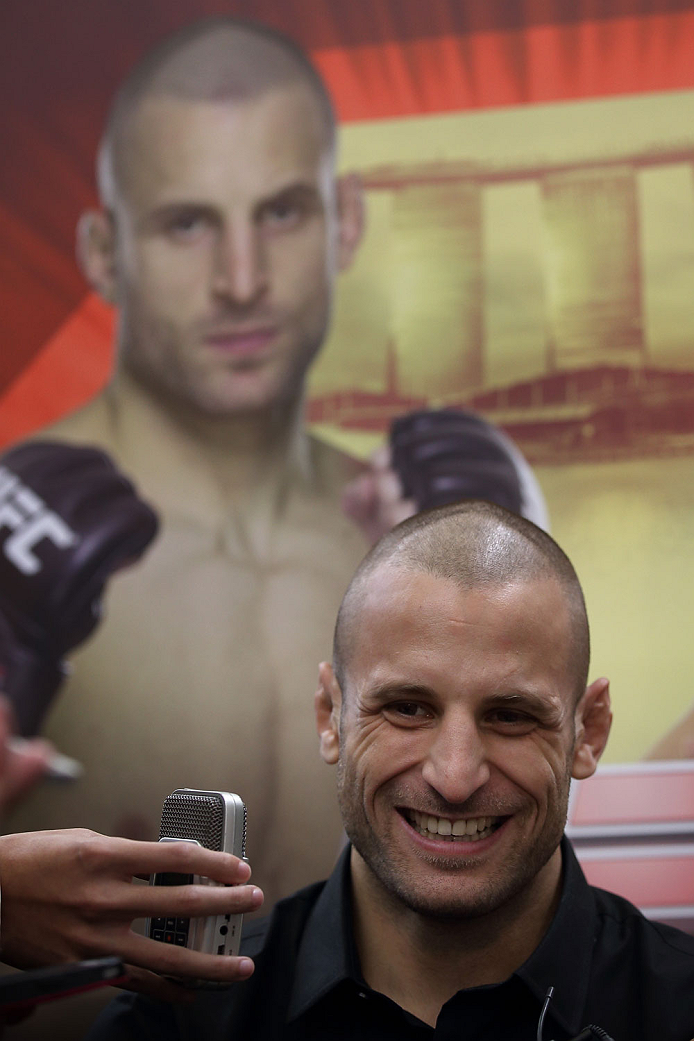 SINGAPORE - JANUARY 02: Tarec Saffiedine speaks to the media during the UFC Fight Night Singapore Ultimate Media Day at the Skating Rink at The Shoppes at Marina Bay Sand on January 2, 2014 in Singapore. (Photo by Suhaimi Abdullah/Zuffa LLC)